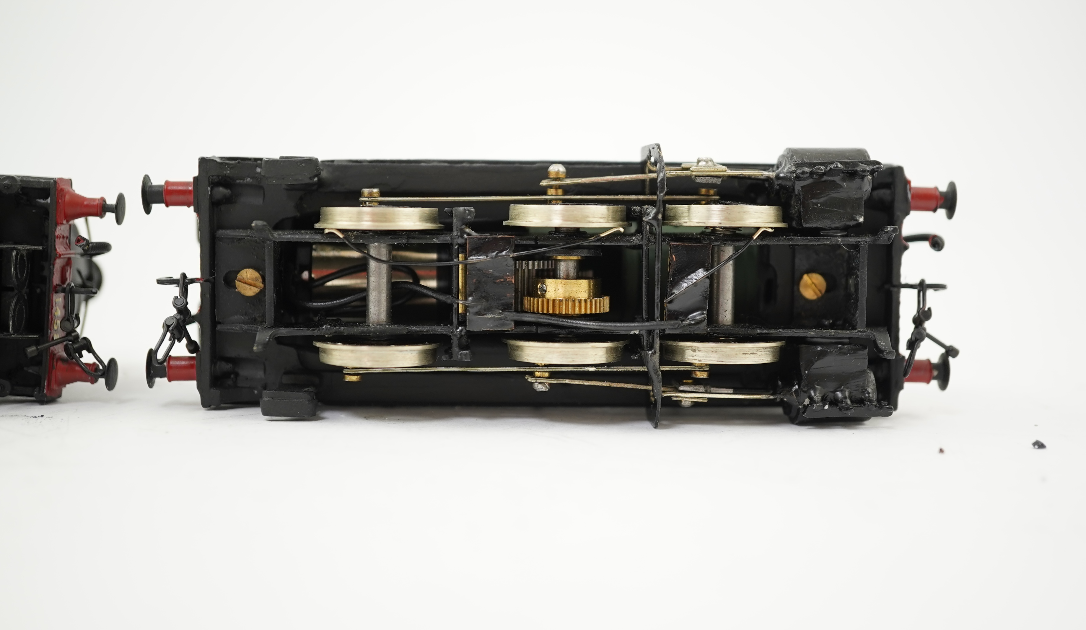 Two 00 gauge brass and white metal kit built GWR tank locomotives; a 1400 class 2-4-0T, 1458, together with an 1366 class 0-6-0PT, 1366, constructed, painted and lined to a high standard, both motored for two rail operat